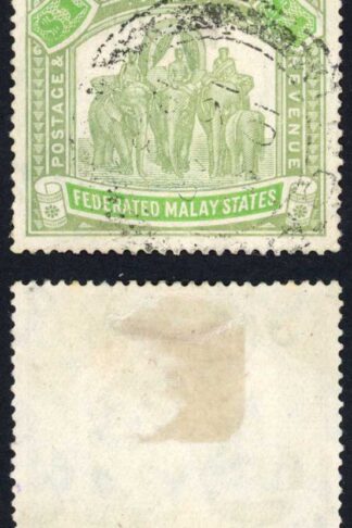 Malay SG76 One Dollar Pale Green and Green (faded) Probably Fiscally used