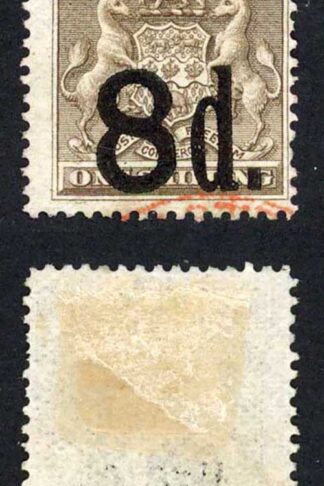 Rhodesia SG17 8d on 1/- brown with small part Red cancel at base