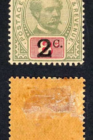 Sarawak SG24 2c on 8c Green and Carmine M/M (toned) Cat 4.25 pounds